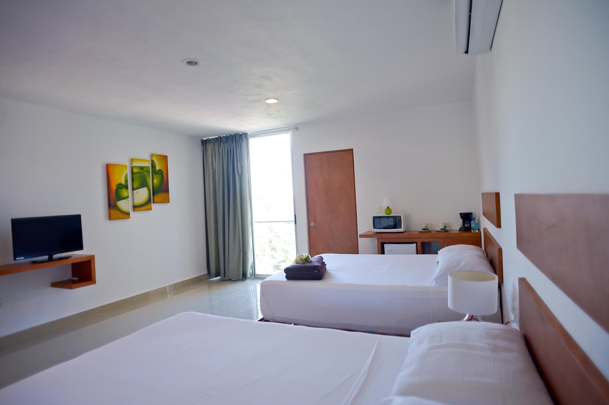 Sunrise 42 Suites Hotel Playa del Carmen Buitenkant foto